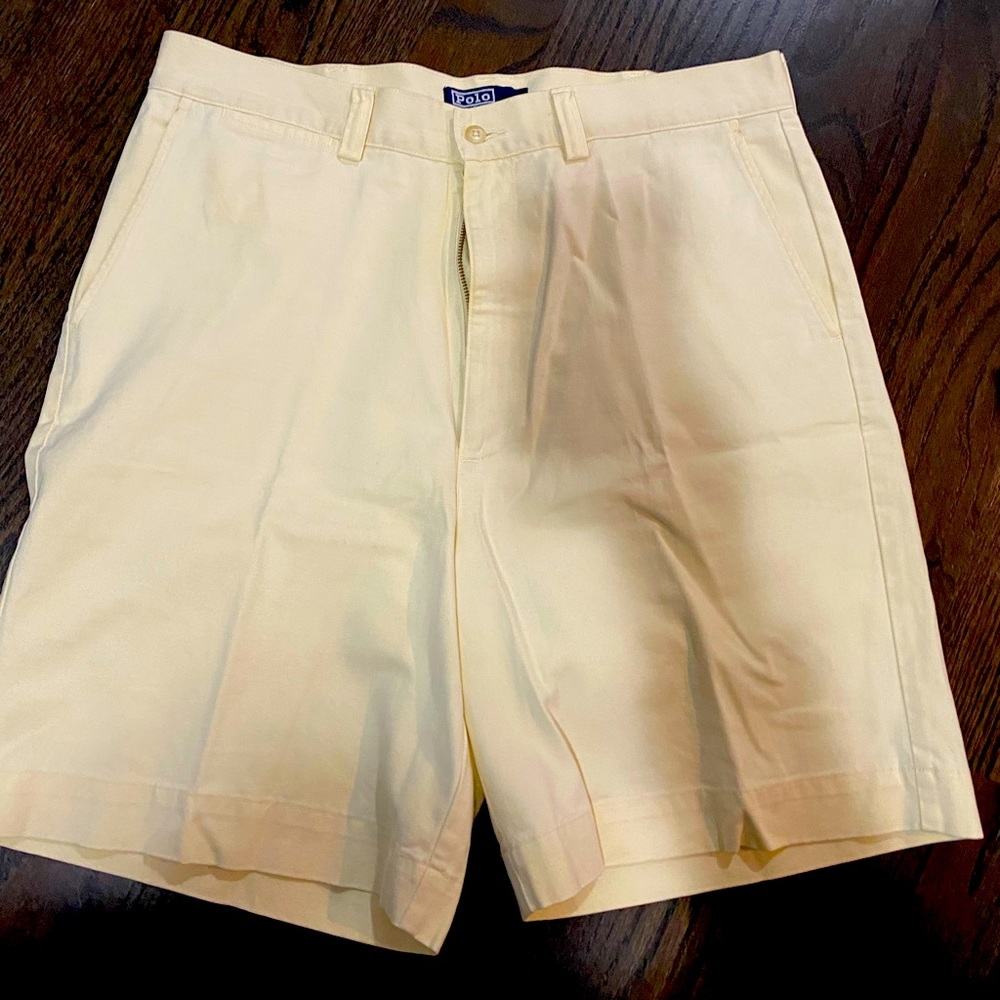 Men’s Ralph Lauren polo golf shorts in soft yellow.